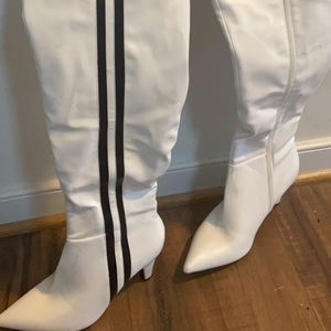 Tall white boots